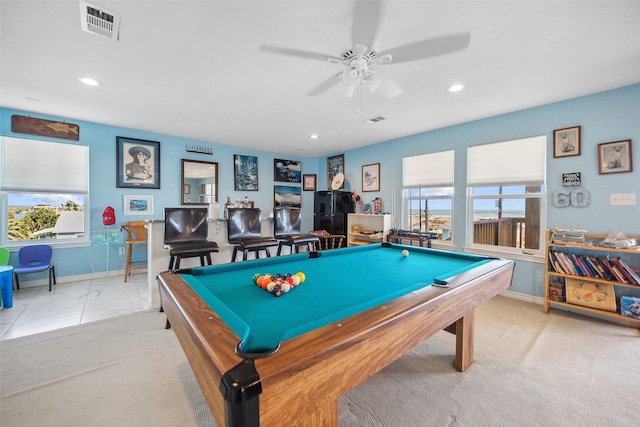 game room featuring recessed lighting, a healthy amount of sunlight, visible vents, and baseboards