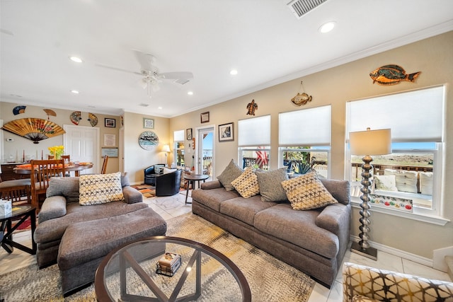 living room with crown molding, light tile patterned floors, recessed lighting, and visible vents