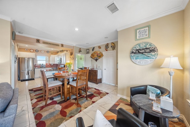 dining area with visible vents, baseboards, ornamental molding, recessed lighting, and marble finish floor