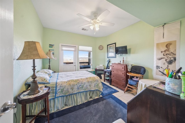 tiled bedroom with visible vents and ceiling fan