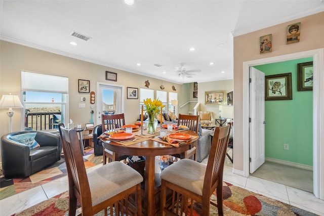 dining space featuring visible vents, baseboards, ornamental molding, recessed lighting, and marble finish floor