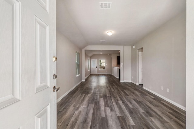 entrance foyer featuring visible vents, dark wood-type flooring, and baseboards