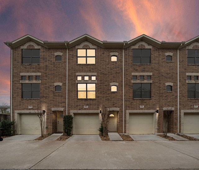 exterior space with an attached garage and driveway