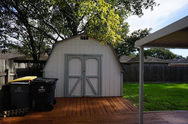 view of shed with fence