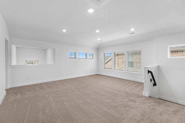 carpeted empty room featuring visible vents, recessed lighting, and baseboards