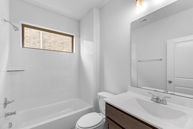 full bathroom with visible vents, vanity, toilet, and bathing tub / shower combination