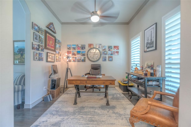 office area with ceiling fan, baseboards, wood finished floors, and ornamental molding