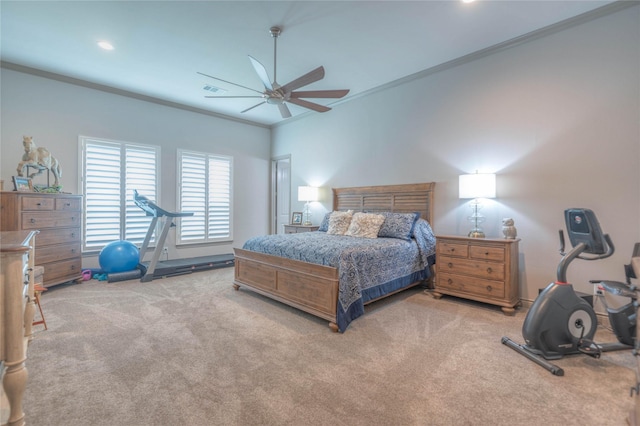 bedroom featuring carpet flooring, visible vents, crown molding, and ceiling fan