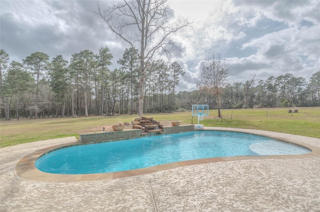 pool featuring a lawn