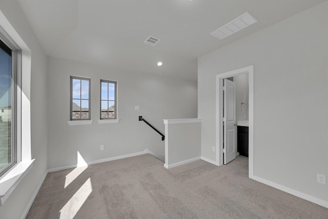 2512 Seneca Lake Dr, Texas City, TX 77568 - carpeted spare room with baseboards and recessed lighting