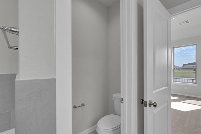 2512 Seneca Lake Dr, Texas City, TX 77568 - bathroom with baseboards and toilet