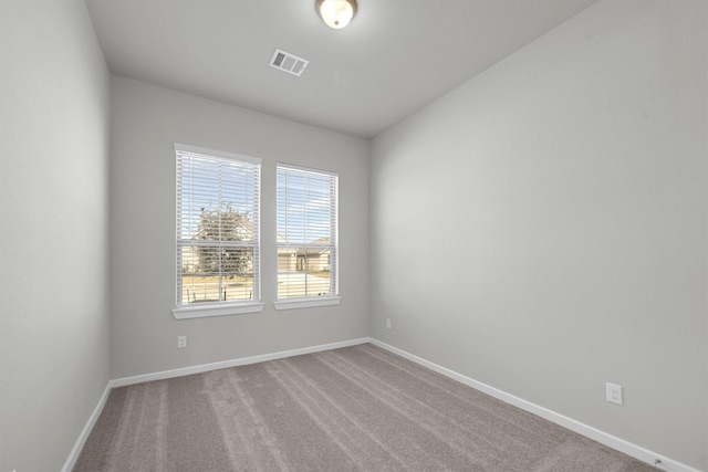 2512 Seneca Lake Dr, Texas City, TX 77568 - unfurnished room featuring baseboards and carpet