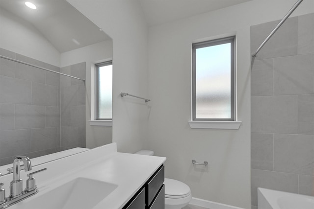 2512 Seneca Lake Dr, Texas City, TX 77568 - bathroom with toilet, vanity, baseboards, and vaulted ceiling