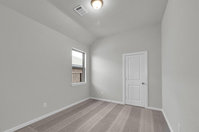 2512 Seneca Lake Dr, Texas City, TX 77568 - spare room with vaulted ceiling, baseboards, and carpet floors