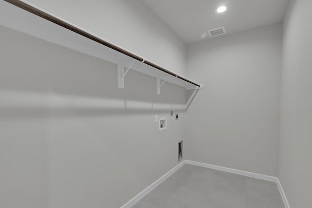 2512 Seneca Lake Dr, Texas City, TX 77568 - laundry area with electric dryer hookup, washer hookup, hookup for a gas dryer, baseboards, and recessed lighting