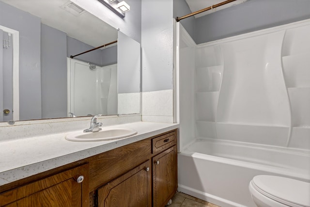 bathroom with tile patterned floors, visible vents, toilet, vanity, and shower / bathtub combination