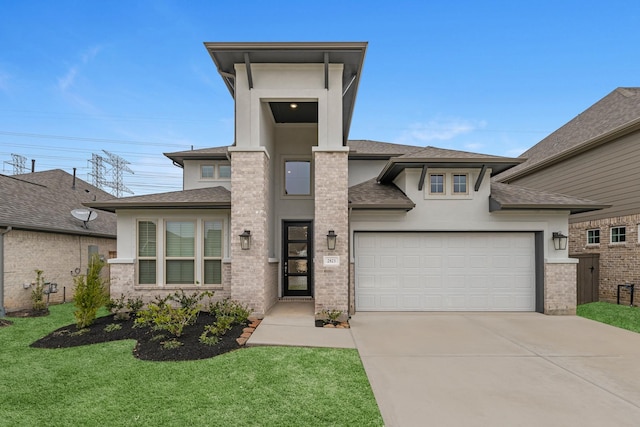 prairie-style house with an attached garage, a front yard, roof with shingles, stucco siding, and driveway