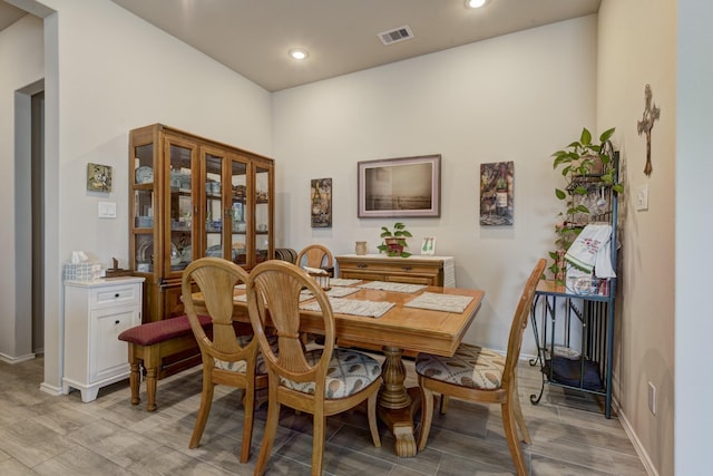 dining space with visible vents, recessed lighting, baseboards, and wood finish floors