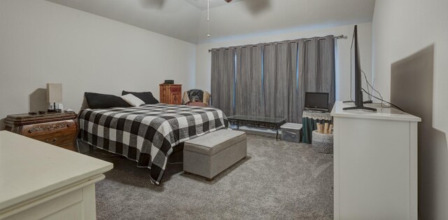 bedroom with light carpet and ceiling fan