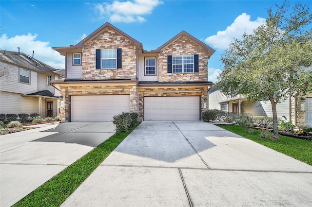 view of front of home with an attached garage, stone siding, and driveway