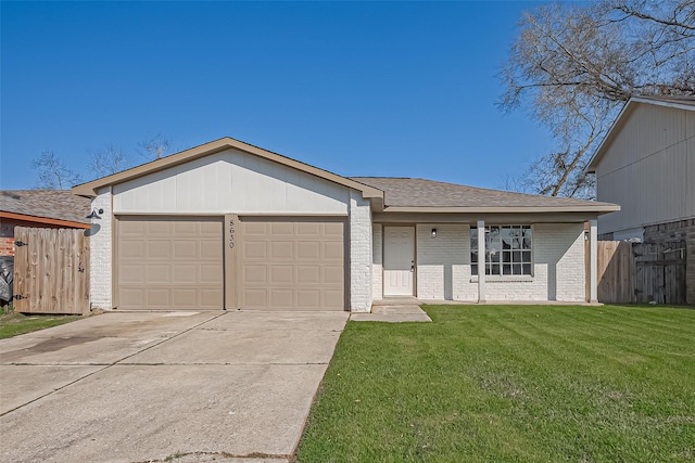 single story home featuring fence, concrete driveway, a front yard, an attached garage, and brick siding