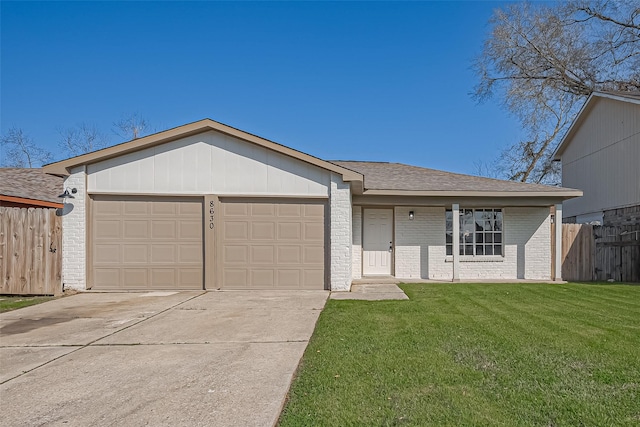 ranch-style house with fence, concrete driveway, a front yard, a garage, and brick siding