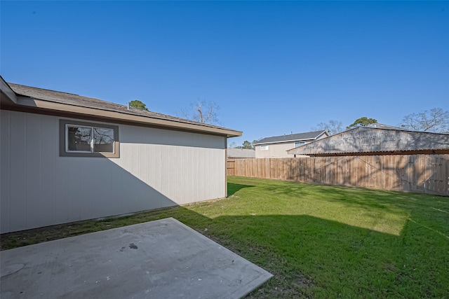 view of yard with a patio and fence