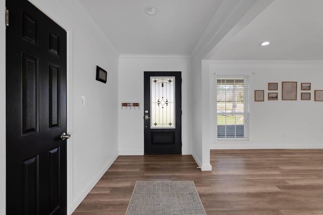 entrance foyer featuring recessed lighting, baseboards, wood finished floors, and crown molding