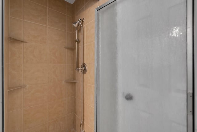 bathroom featuring a stall shower