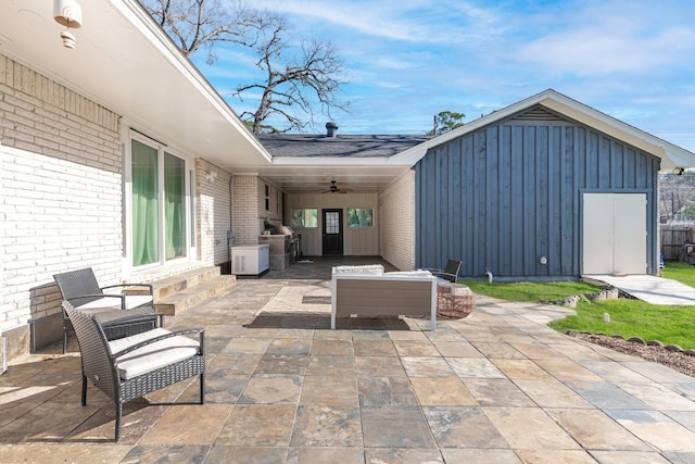 view of patio with an outdoor hangout area and ceiling fan