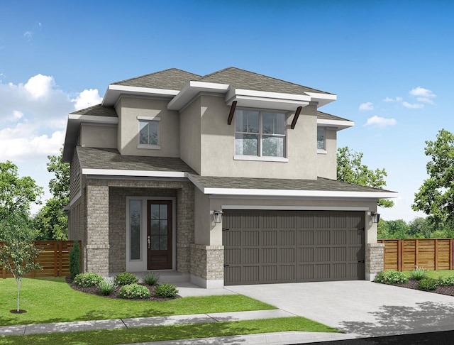 prairie-style house featuring stucco siding, concrete driveway, and fence