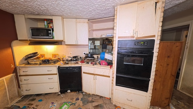 kitchen featuring visible vents, open shelves, black appliances, light countertops, and a textured ceiling