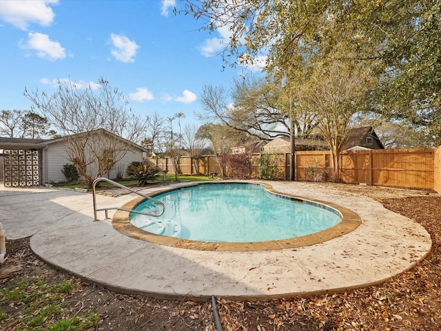 view of pool featuring a patio area, a fenced backyard, and a fenced in pool