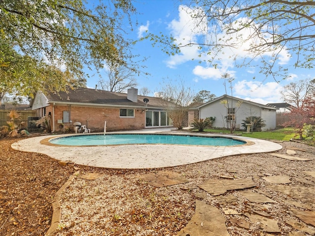 pool featuring a patio area