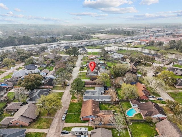 birds eye view of property with a residential view