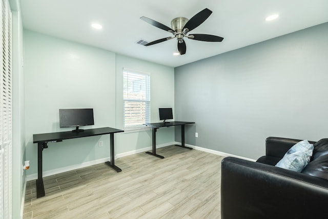 home office with a ceiling fan, wood finished floors, visible vents, baseboards, and recessed lighting