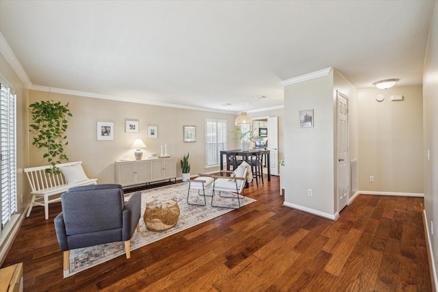 living area with crown molding, baseboards, and wood finished floors