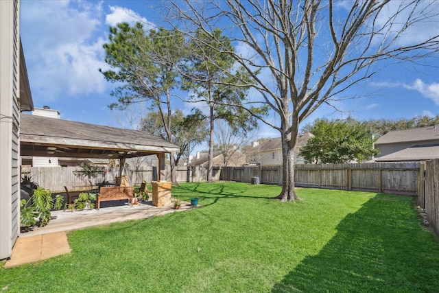 view of yard featuring a fenced backyard and a patio area