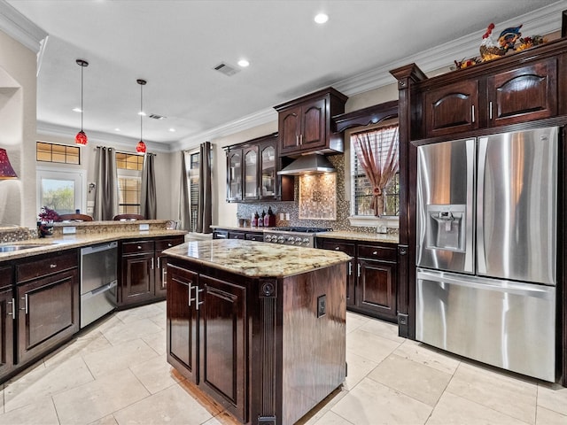 kitchen with ornamental molding, visible vents, appliances with stainless steel finishes, and range hood