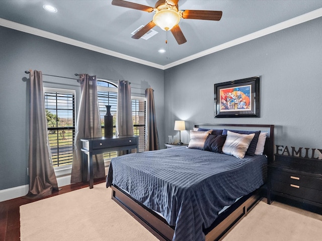 bedroom featuring recessed lighting, crown molding, baseboards, and a ceiling fan