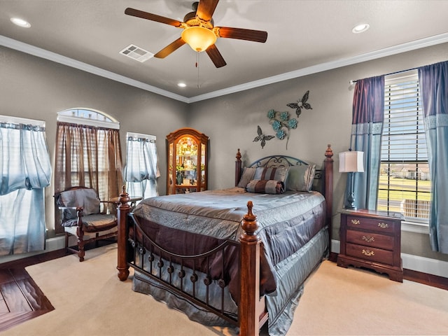 bedroom with recessed lighting, baseboards, visible vents, and ornamental molding