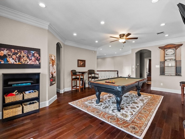 game room featuring wood finished floors, arched walkways, and baseboards