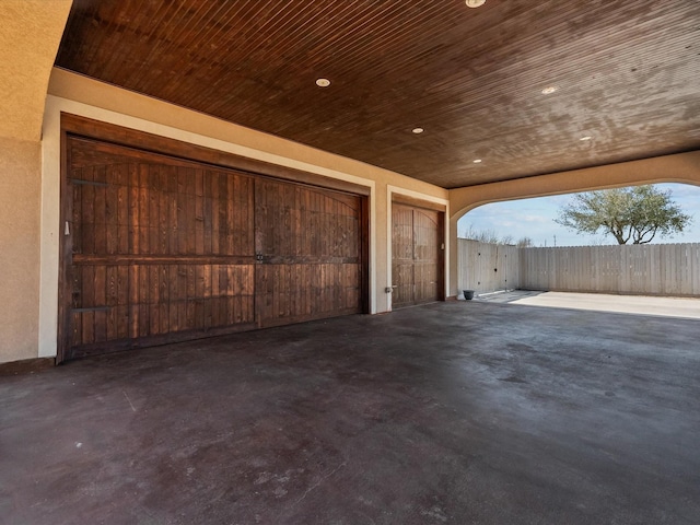 garage featuring fence