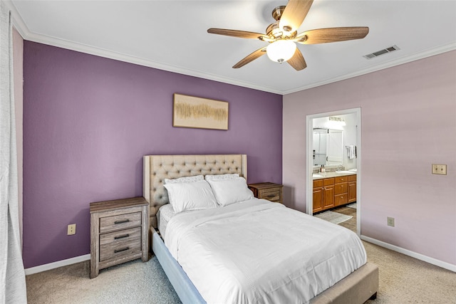 bedroom featuring visible vents, baseboards, light colored carpet, and crown molding