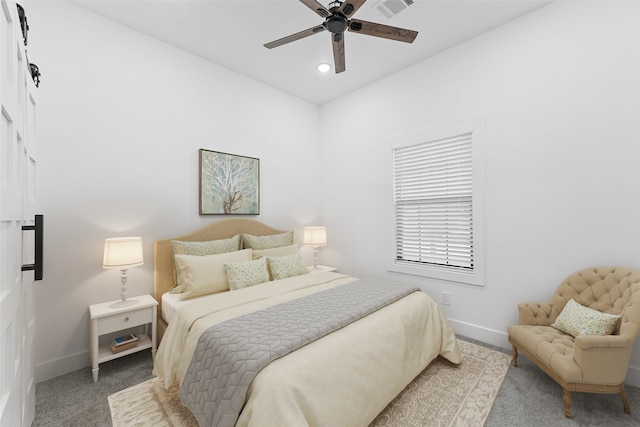 carpeted bedroom featuring a ceiling fan, recessed lighting, baseboards, and visible vents