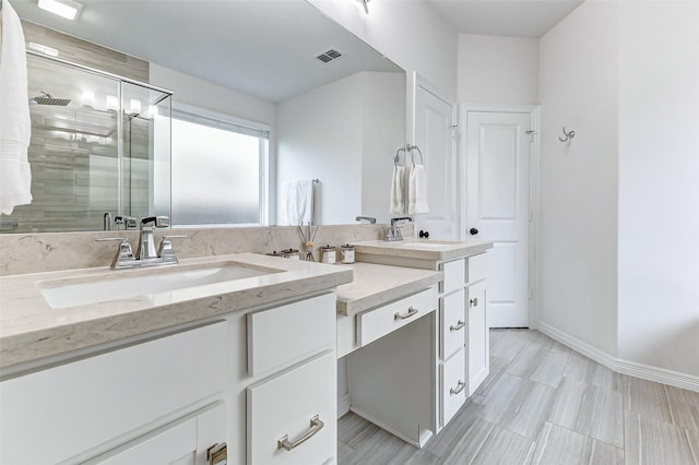 30715 Parkside Passage Dr, Fulshear, TX 77441 - full bath featuring a stall shower, double vanity, and baseboards