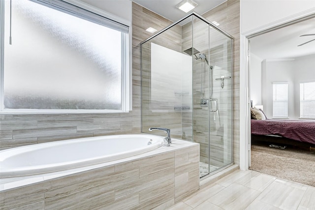30715 Parkside Passage Dr, Fulshear, TX 77441 - ensuite bathroom featuring a shower stall, a bath, and a ceiling fan