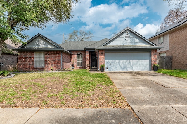 ranch-style home with driveway, a front lawn, fence, an attached garage, and brick siding