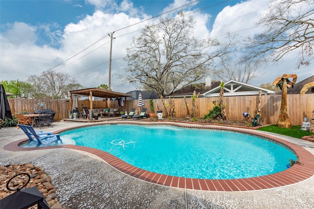 view of pool with outdoor dining area, a fenced backyard, outdoor lounge area, a fenced in pool, and a patio area