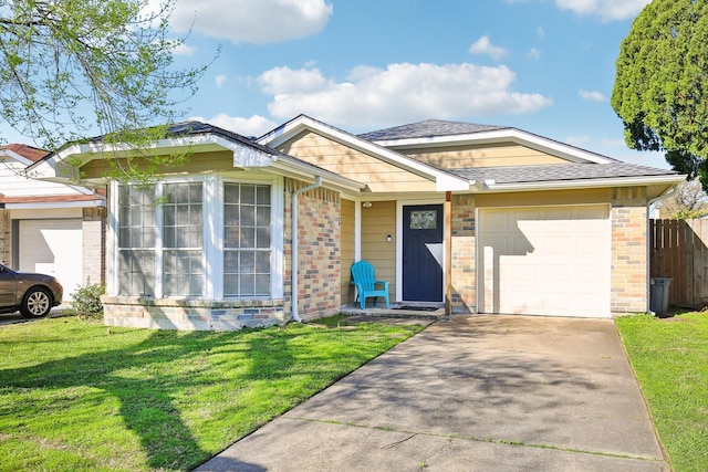 ranch-style home featuring a garage, driveway, brick siding, and a front yard